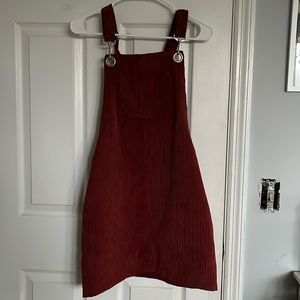 Corduroy burgundy overall dress. Size small could fit medium.